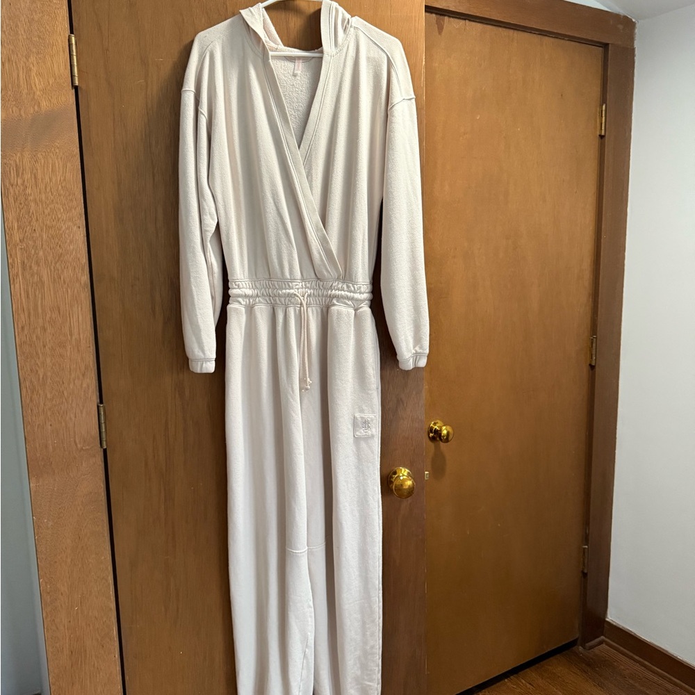 Never worn! FP Movement cream Hooded Jumpsuit - sz small